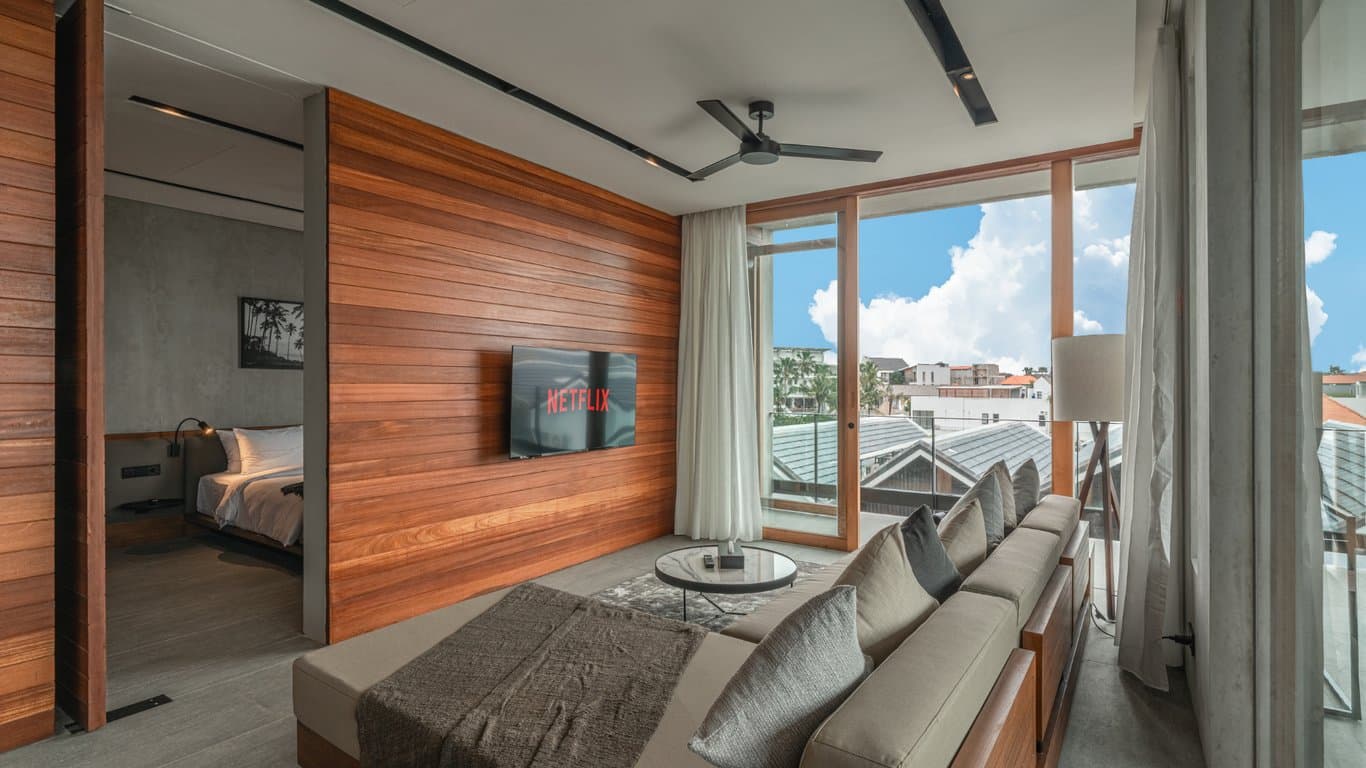 Spacious modern apartment interior with balcony view